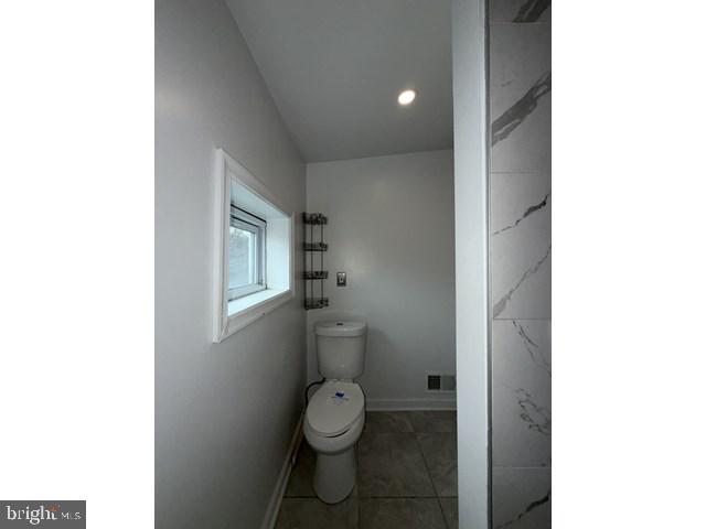 1609 Lemmon Street Baltimore, MD 21223 - Photo 11 of 16 a bathroom with a toilet and a shower