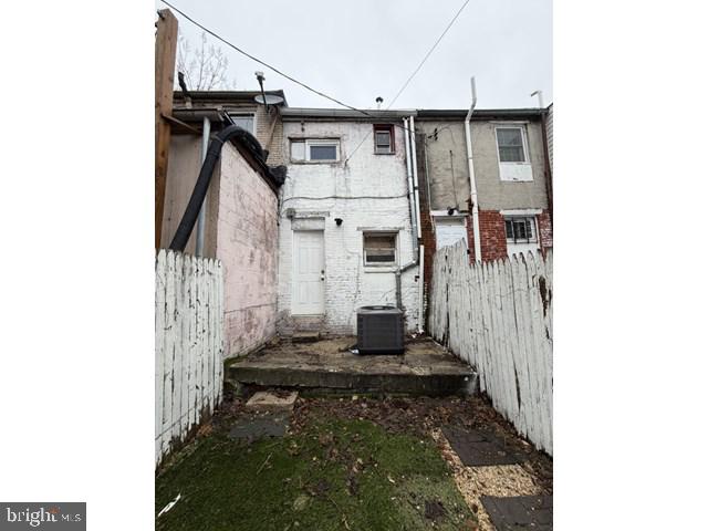 1609 Lemmon Street Baltimore, MD 21223 - Photo 16 of 16 a view of a house with wooden walls