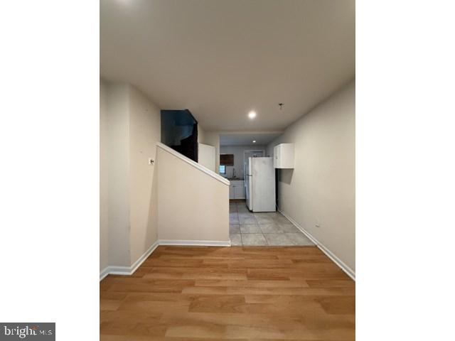 1609 Lemmon Street Baltimore, MD 21223 - Photo 2 of 16 a view of empty room with wooden floor