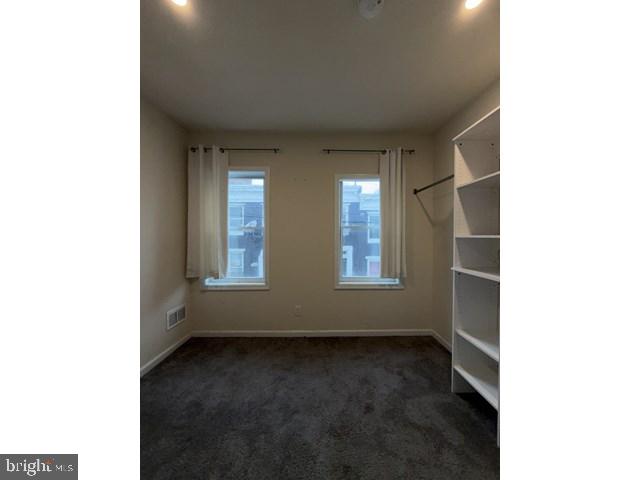 1609 Lemmon Street Baltimore, MD 21223 - Photo 7 of 16 a view of room with window and hardwood floor