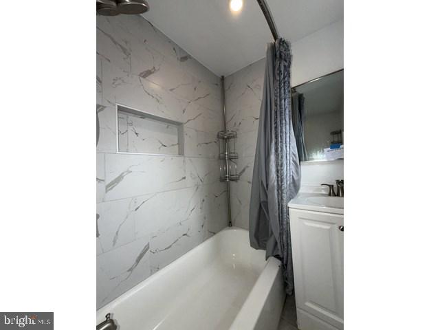 1609 Lemmon Street Baltimore, MD 21223 - Photo 10 of 16 a bathroom with a bathtub and a shower