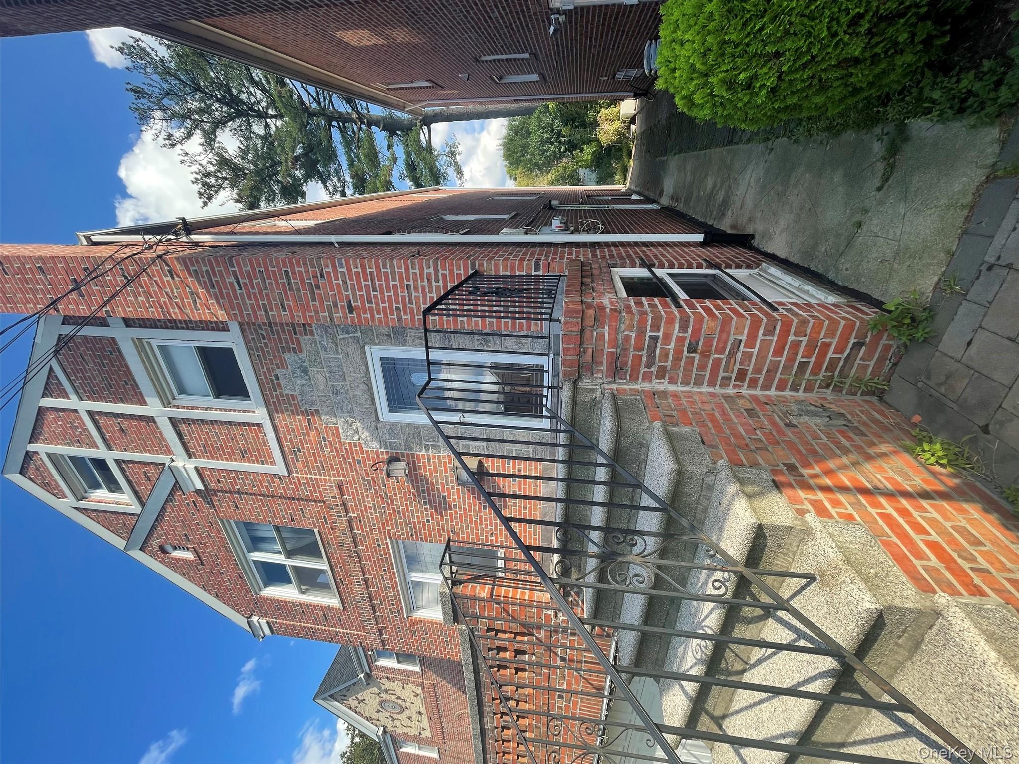 1194 Lydig Avenue Bronx, NY 10461 - Photo 2 of 7 a front view of a house with balcony