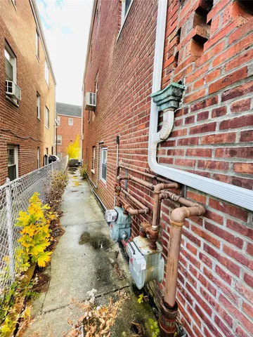 a view of a pathway both side of building