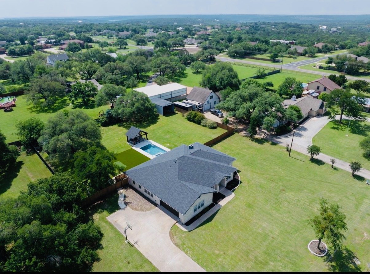 108 Kyle Lane Georgetown, TX 78633 - Photo 26 of 26 Spacious residential property featuring a dark-shingled roof and a light-colored exterior