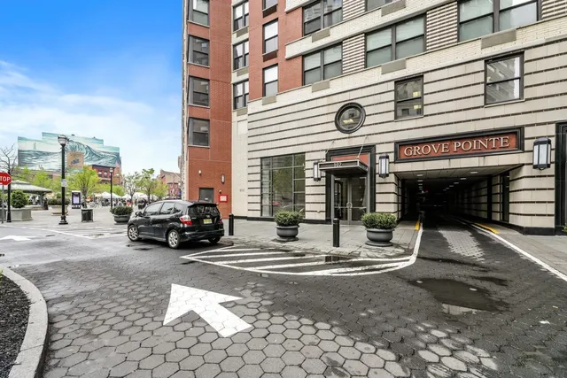 a view of a street with cars