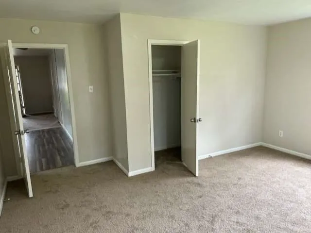 an empty room with closet