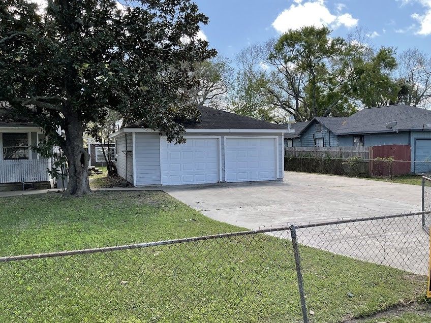 201 Smith Street Clute, TX 77531 - Photo 22 of 22 a house view with a backyard space