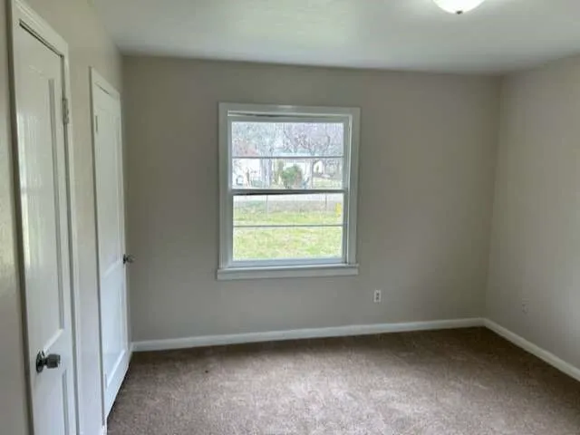 an empty room with a window