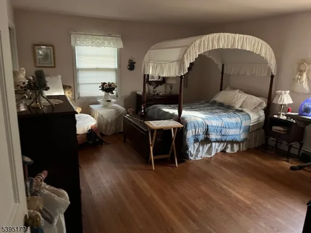 a living room with furniture dining table and a fireplace