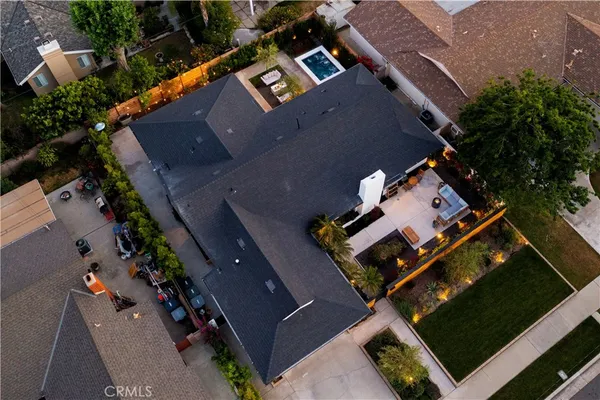 an aerial view of house with yard