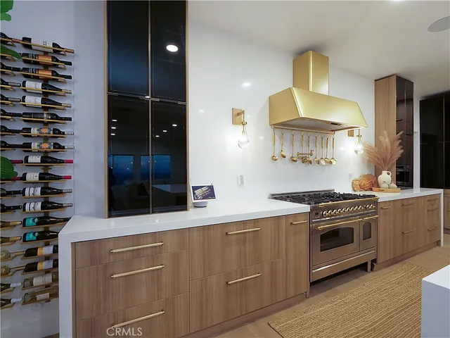 a kitchen with a stove and a sink