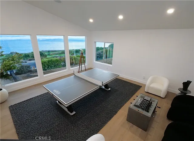 a living room with furniture rug and window