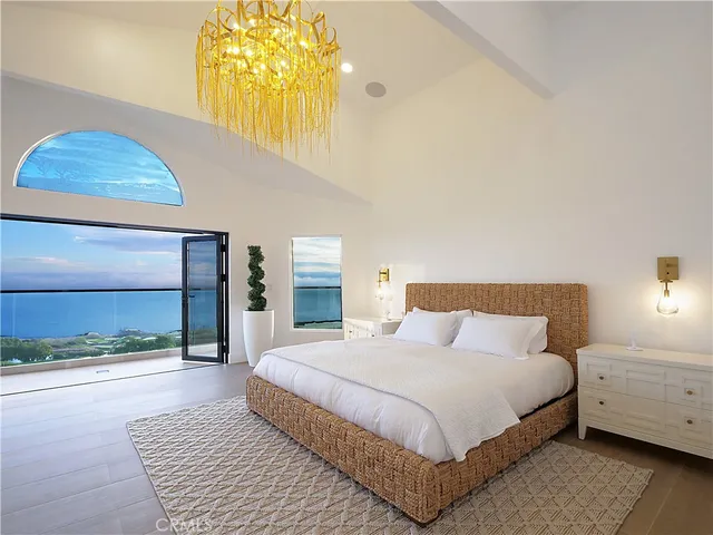 a view of a livingroom with furniture and a potted plant