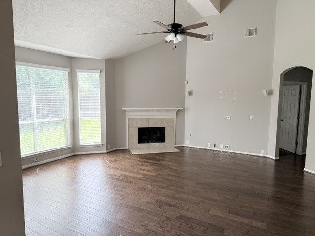 20030 Castlegreen Drive Spring, TX 77388 - Photo 8 of 23 an empty room with wooden floor a ceiling fan and windows