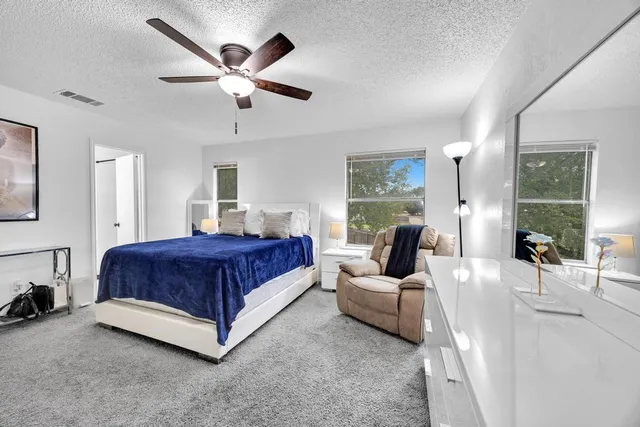 a living room with furniture and window