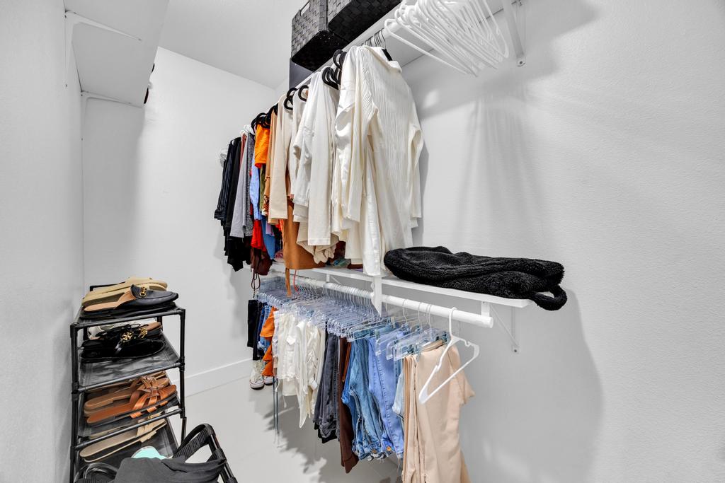 600 Smoke Signal Pass Pflugerville, TX 78660 - Photo 31 of 35 a view of walk in closet with clothes and shoes