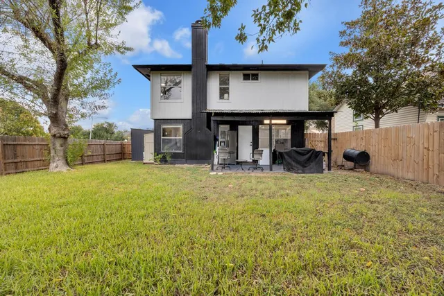 a house view with a garden space