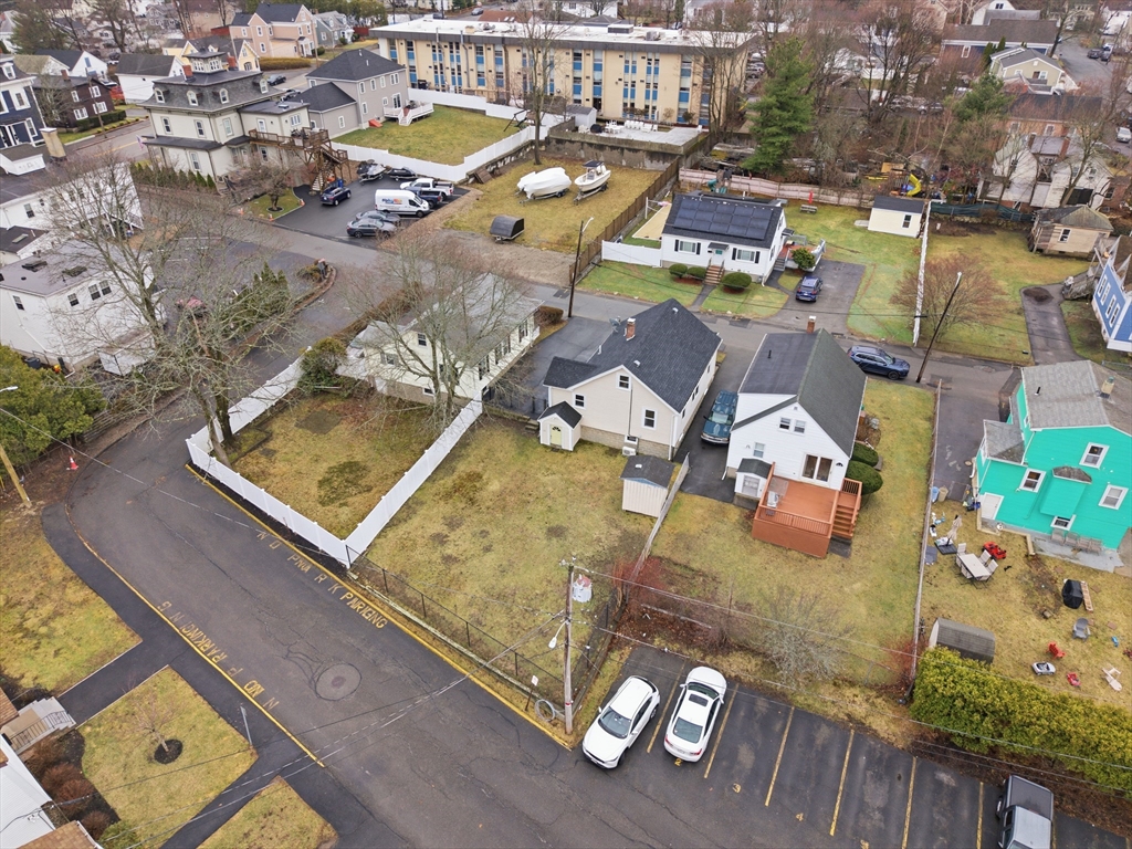 12 Riverside Court Saugus, MA 01906 - Photo 38 of 39 an aerial view of a house with a swimming pool