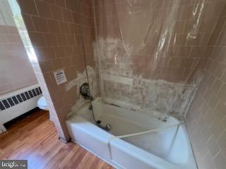 13813 Maple Tree Lane Southwest Cumberland, MD 21502 - Photo 14 of 26 a bathroom with a bathtub