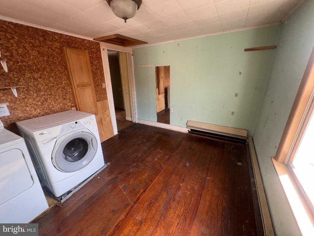 13813 Maple Tree Lane Southwest Cumberland, MD 21502 - Photo 16 of 26 a view of a hallway with washer and dryer