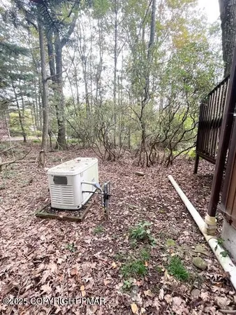 a view of a backyard of the house