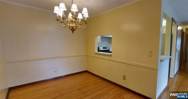 a view of a room with a chandelier