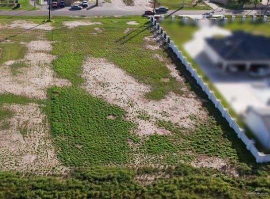 2911 East Alberta Road Edinburg, TX 78542 - Photo 4 of 8 a view of a lake with a yard