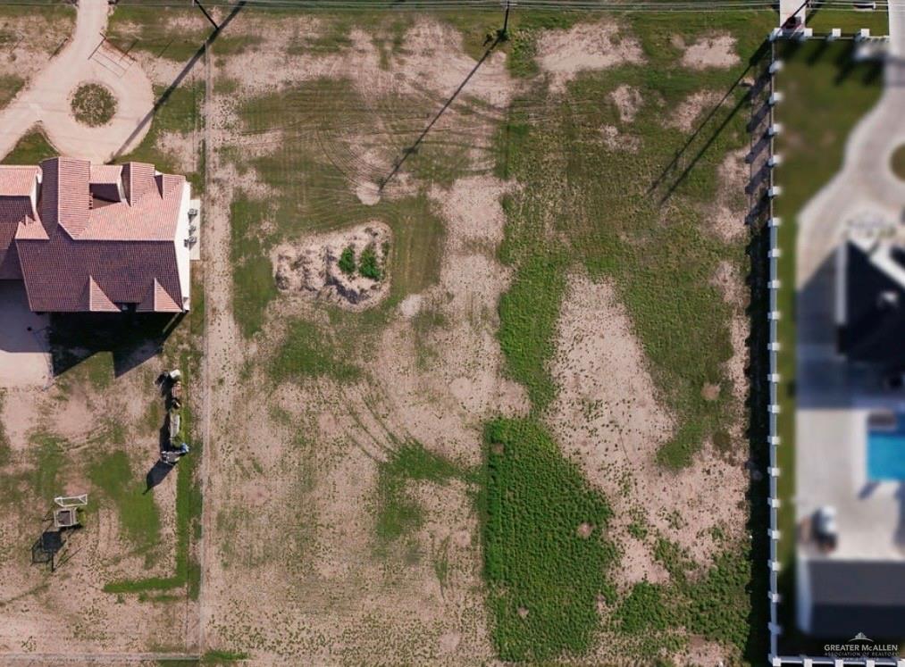 2911 East Alberta Road Edinburg, TX 78542 - Photo 5 of 8 a aerial view of a house with a yard