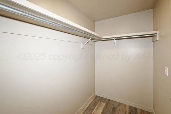 a view of a room with racks on the wall