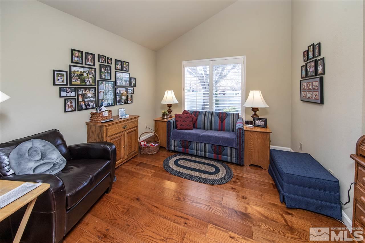 3345 Blackstone Court Reno, NV 89509 - Photo 20 of 29 a living room with furniture a couch and a potted plant