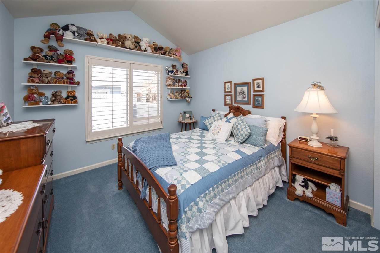 3345 Blackstone Court Reno, NV 89509 - Photo 21 of 29 a bedroom with furniture and a window