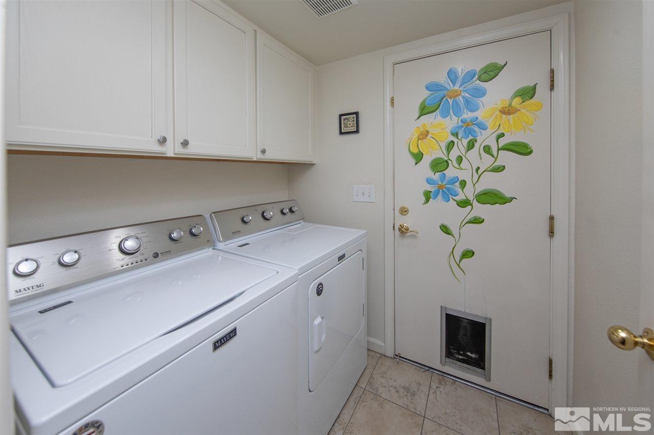 3345 Blackstone Court Reno, NV 89509 - Photo 23 of 29 a utility room with dryer and washer