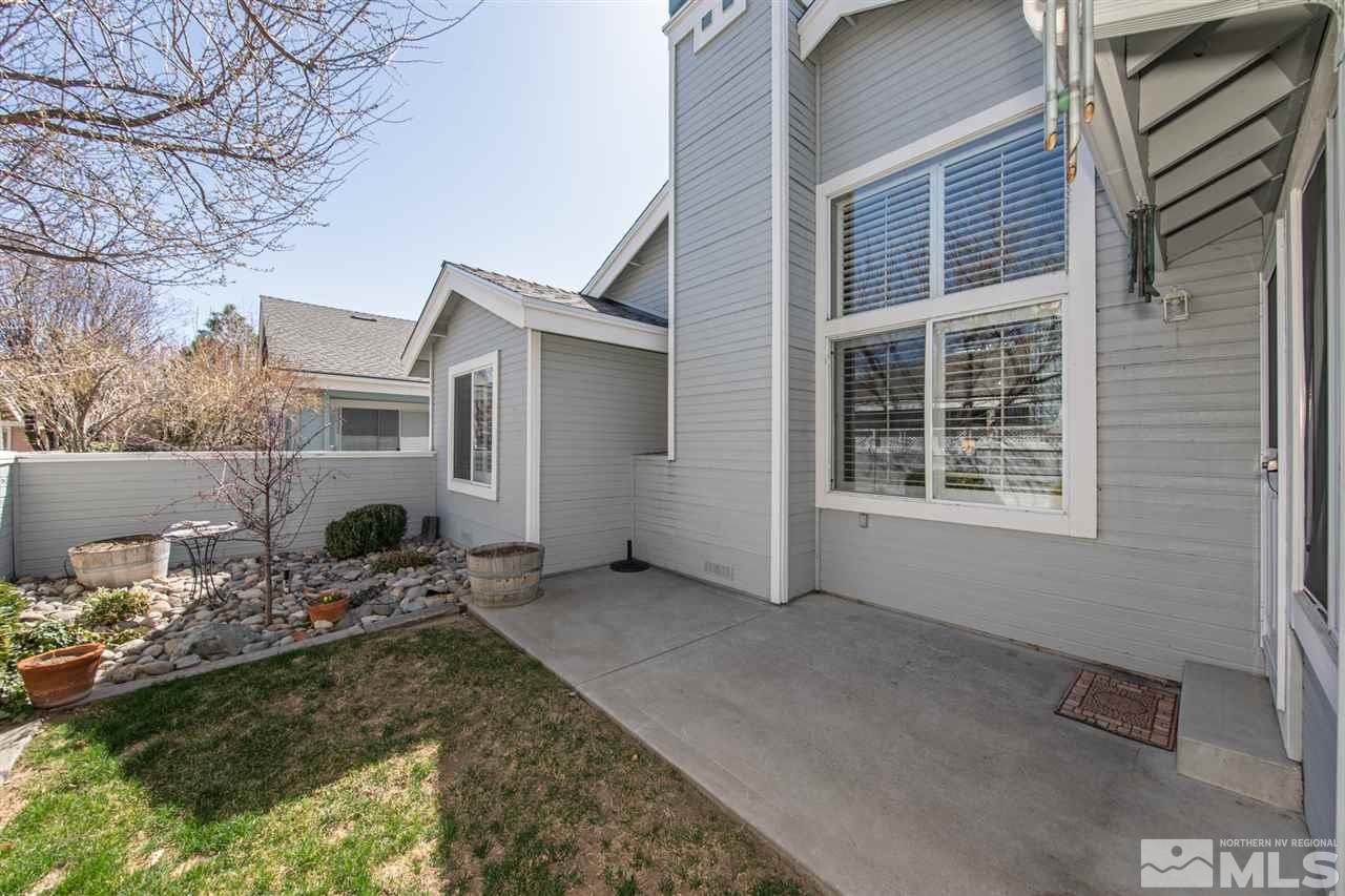 3345 Blackstone Court Reno, NV 89509 - Photo 24 of 29 a backyard of a house with yard fire pit and outdoor seating