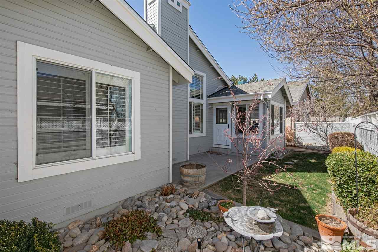3345 Blackstone Court Reno, NV 89509 - Photo 26 of 29 a front view of a house with a yard