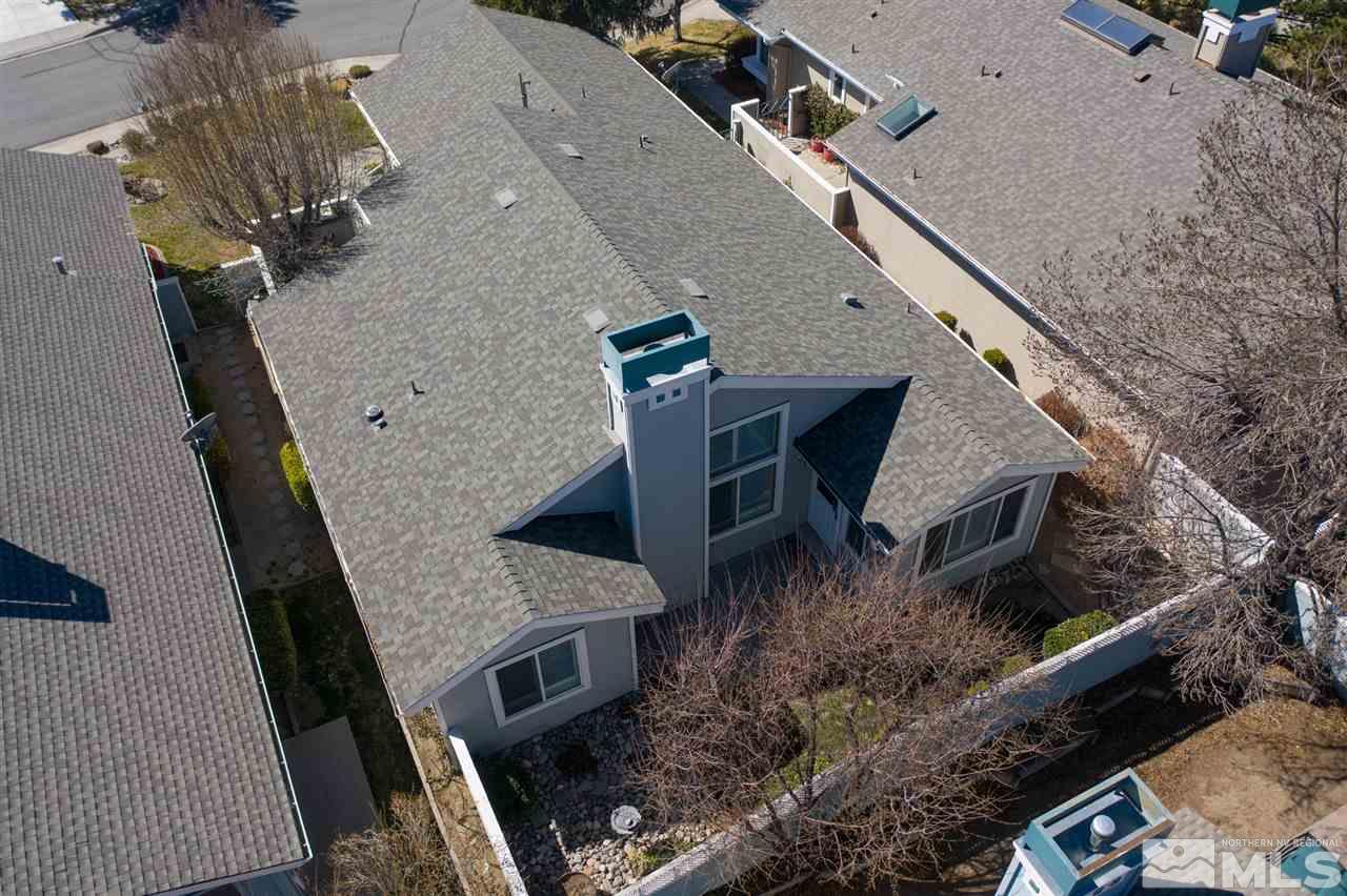 3345 Blackstone Court Reno, NV 89509 - Photo 27 of 29 an aerial view of a house with large trees
