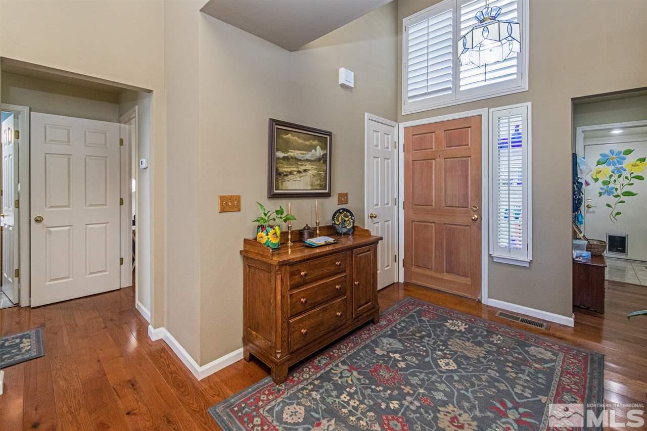 3345 Blackstone Court Reno, NV 89509 - Photo 4 of 29 a room with wooden floor and furniture