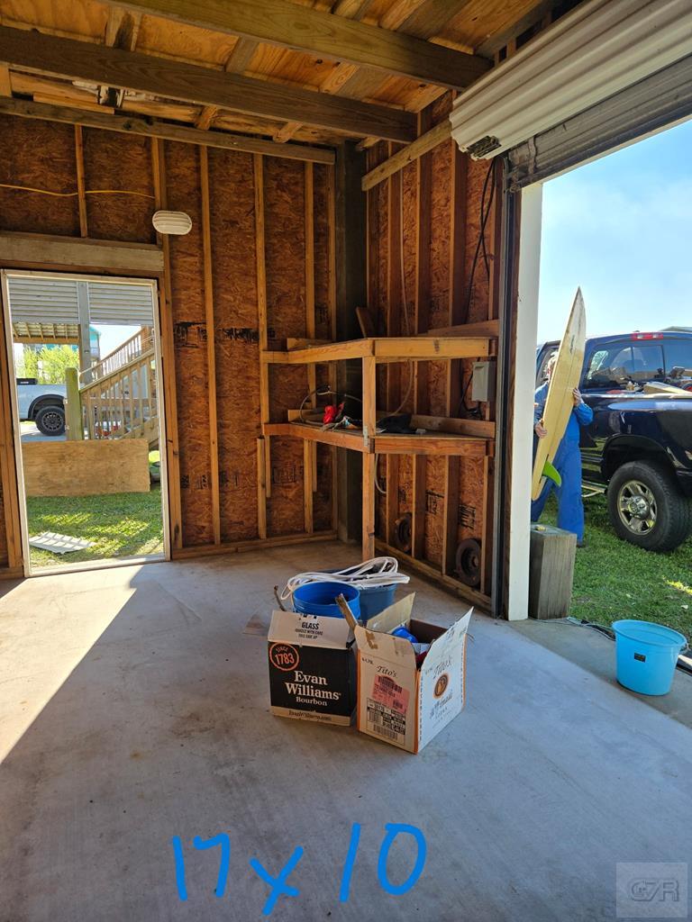 1739 Pompano Lane Crystal Beach, TX 77650 - Photo 17 of 20 a view of car parked in garage