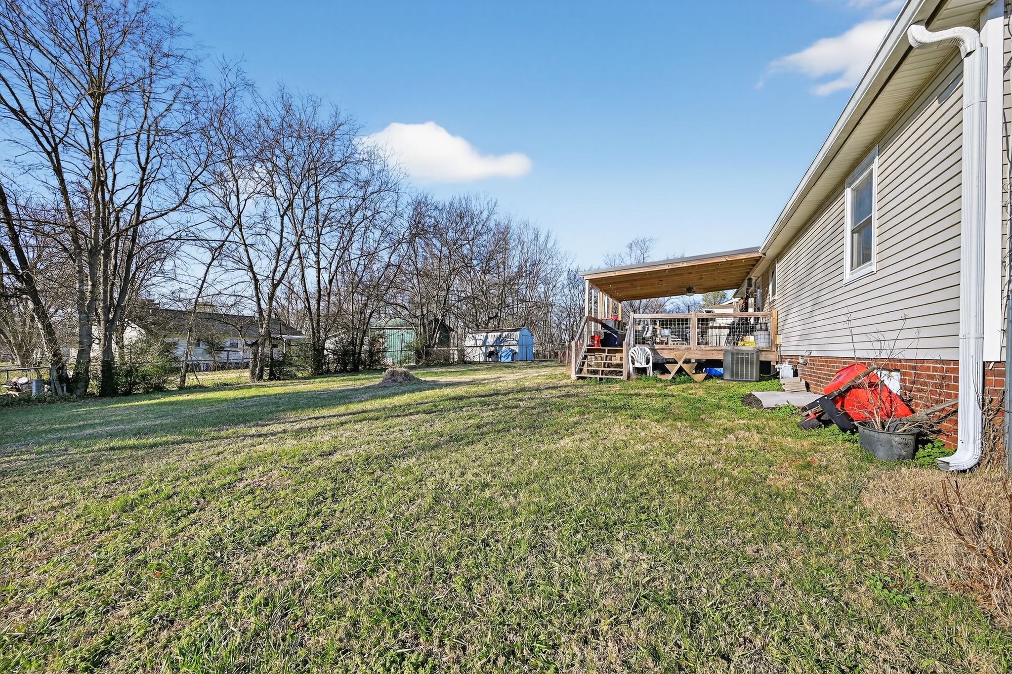 103 Reaves Cove Road Columbia, TN 38401 - Photo 5 of 24 a view of a house with a back yard