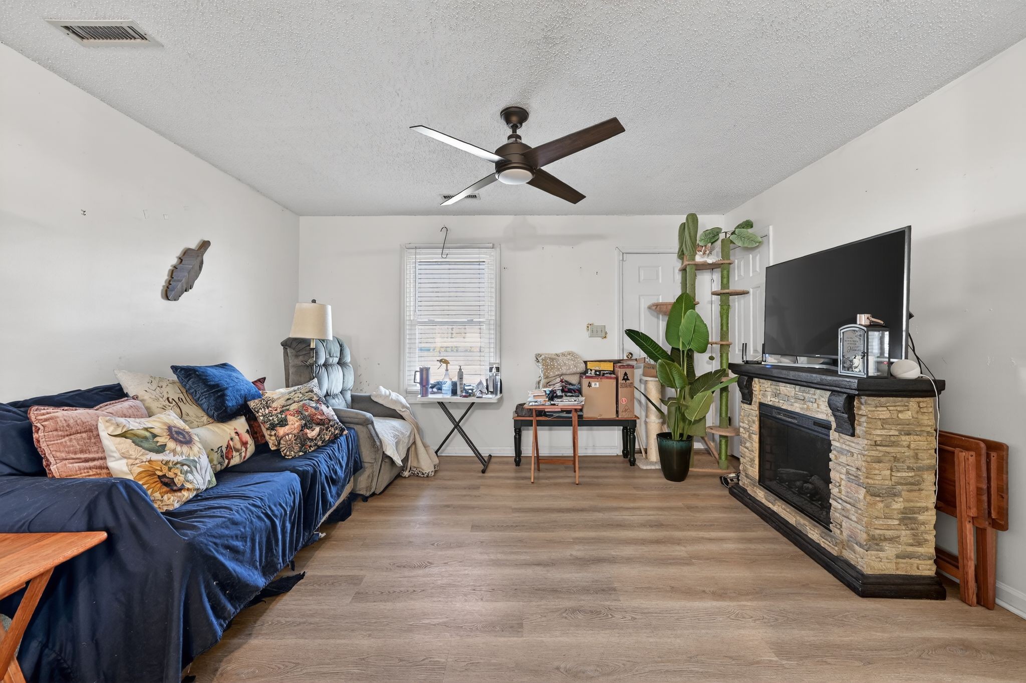 103 Reaves Cove Road Columbia, TN 38401 - Photo 8 of 24 a living room with furniture and a wooden floor