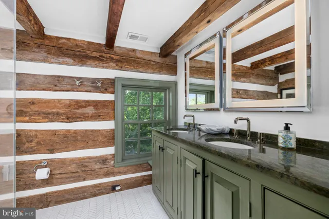 a kitchen with granite countertop a sink and a window