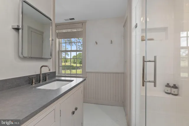 a kitchen with a sink and a window
