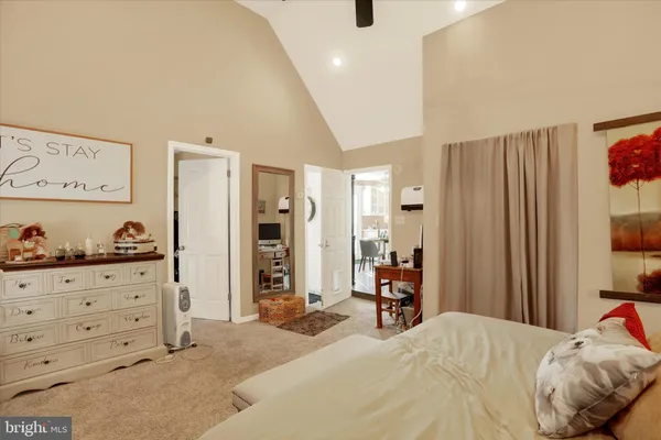 a bedroom with a bed and a closet
