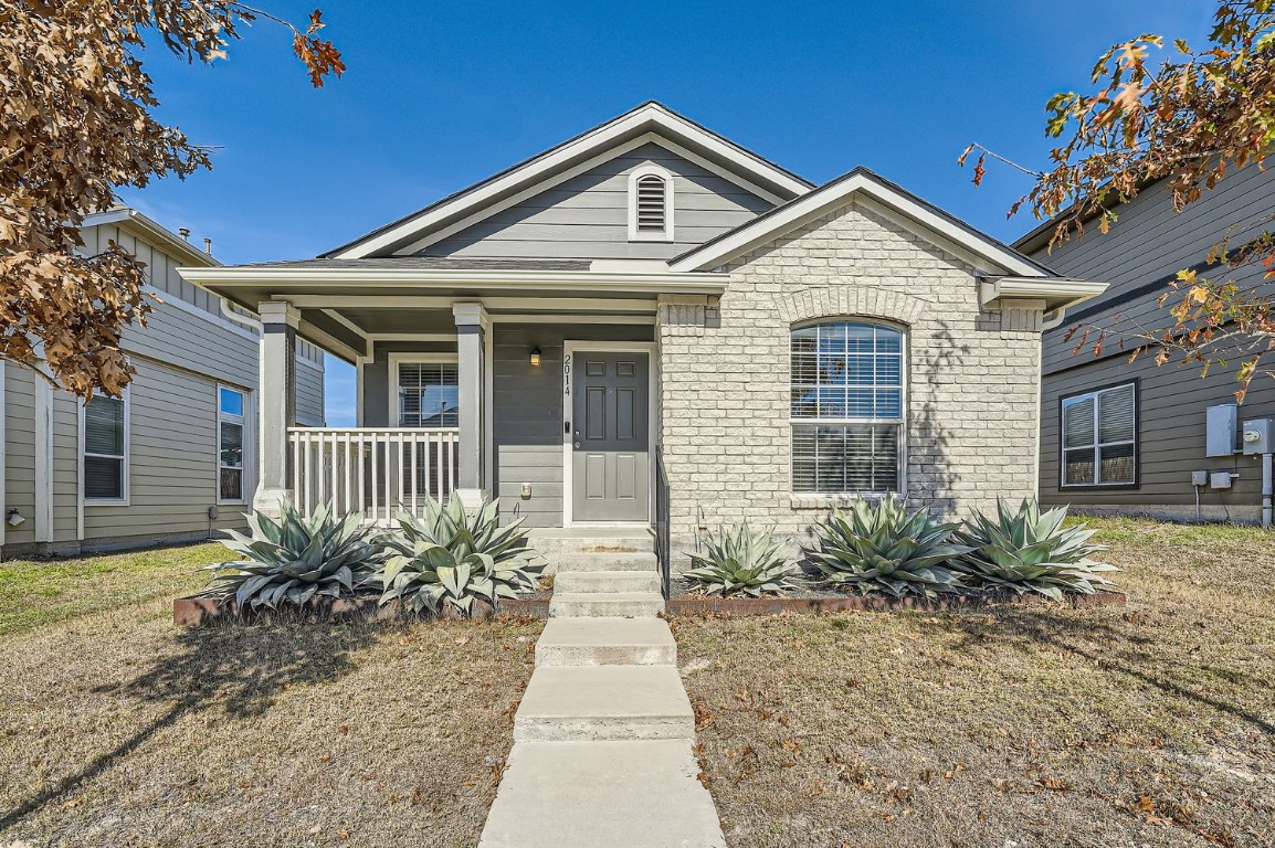 2014 Langdale Lane Austin, TX 78754 - Photo 1 of 1 a front view of a house with garden