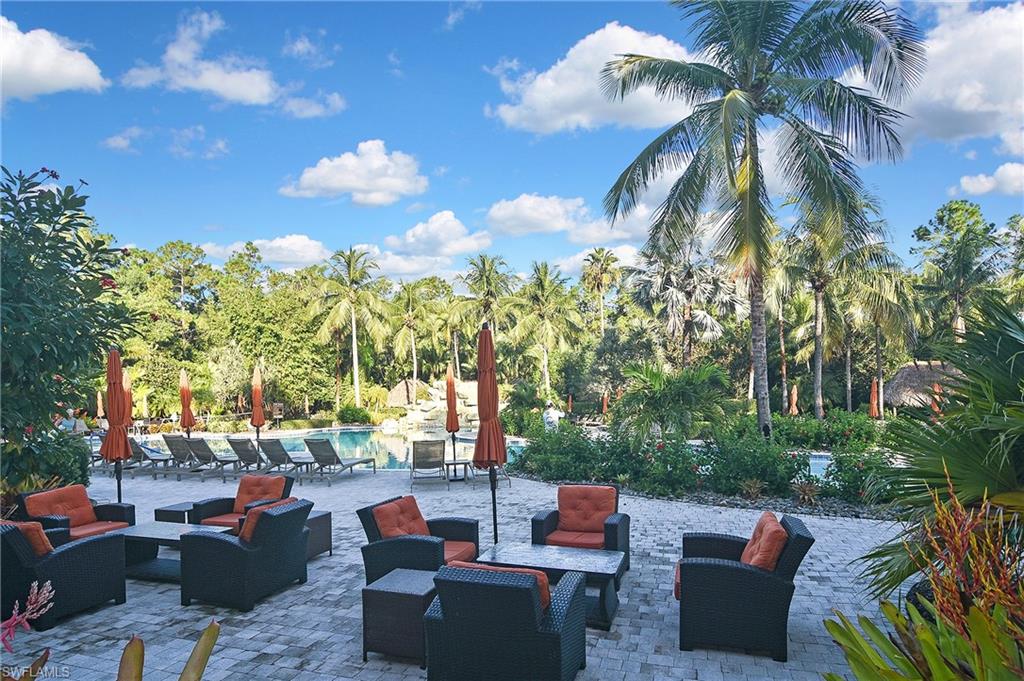 8949 Malibu Street, Unit 303 Naples, FL 34113 - Photo 50 of 50 a view of a patio with couches and a fire pit