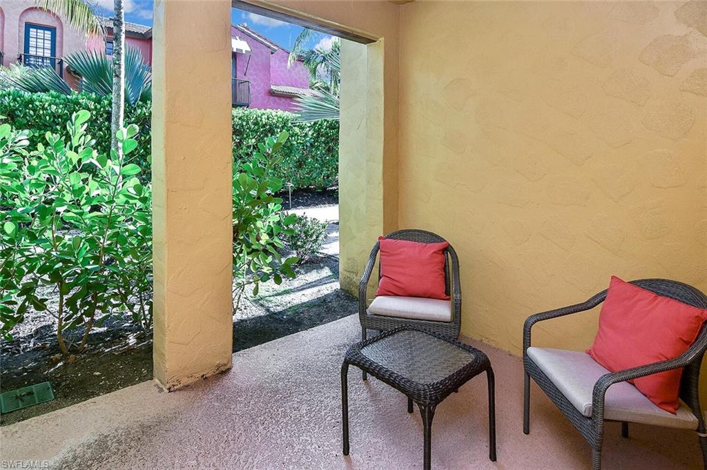 8949 Malibu Street, Unit 303 Naples, FL 34113 - Photo 7 of 50 a view of a room with chairs and a potted plant