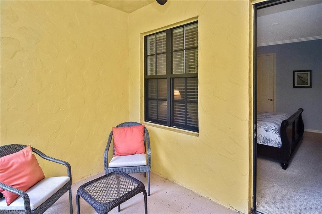 8949 Malibu Street, Unit 303 Naples, FL 34113 - Photo 8 of 50 a view of a room with furniture and a window