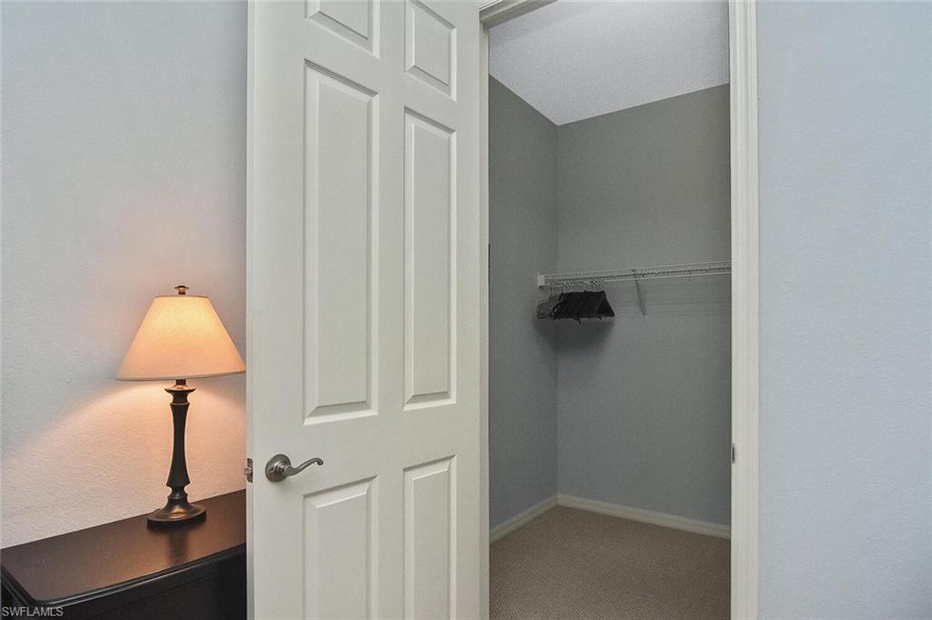 8949 Malibu Street, Unit 303 Naples, FL 34113 - Photo 10 of 50 a bathroom with a shower