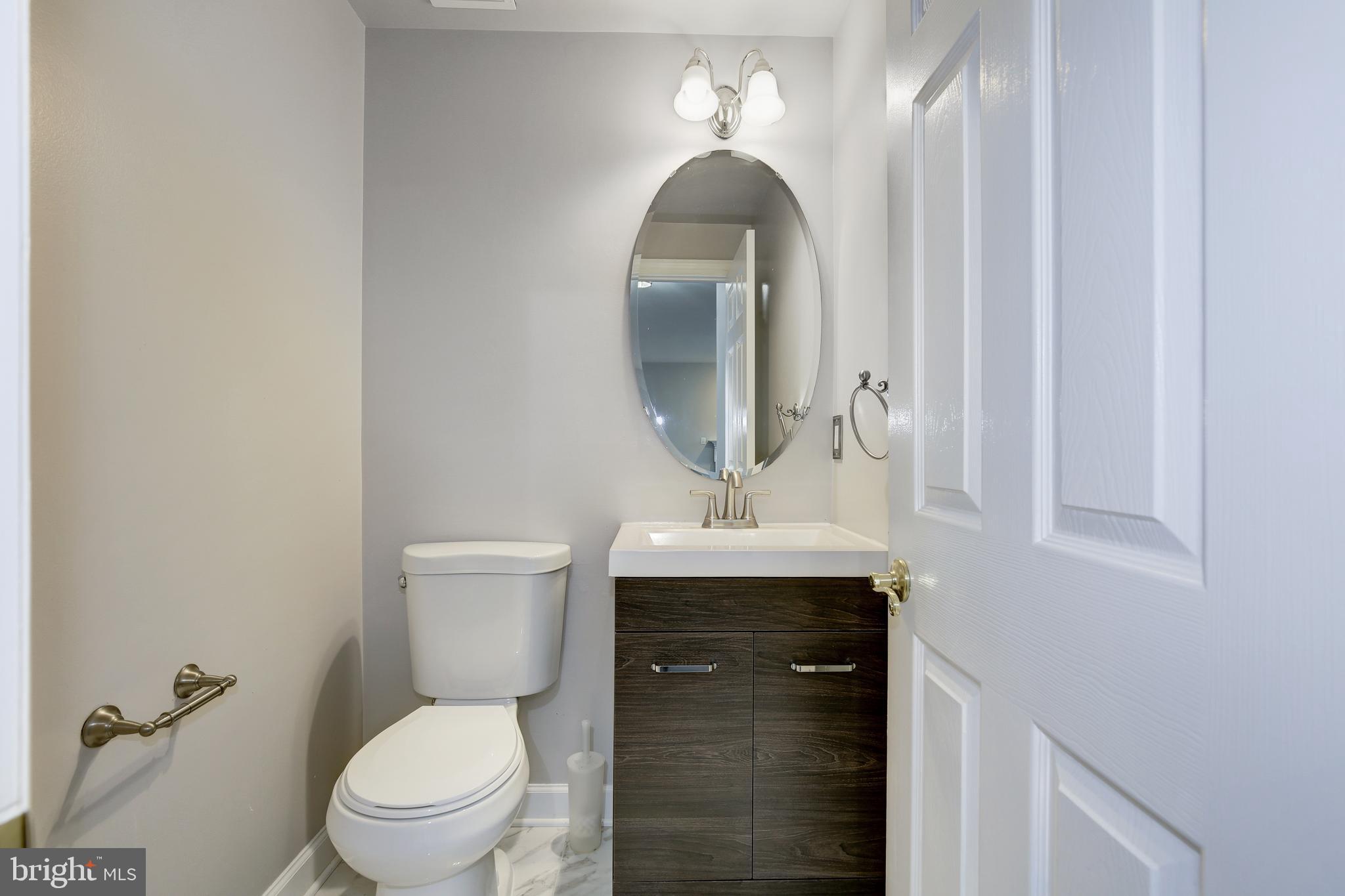 2048 Madrillon Road Vienna, VA 22182 - Photo 24 of 59 main floor powder room
