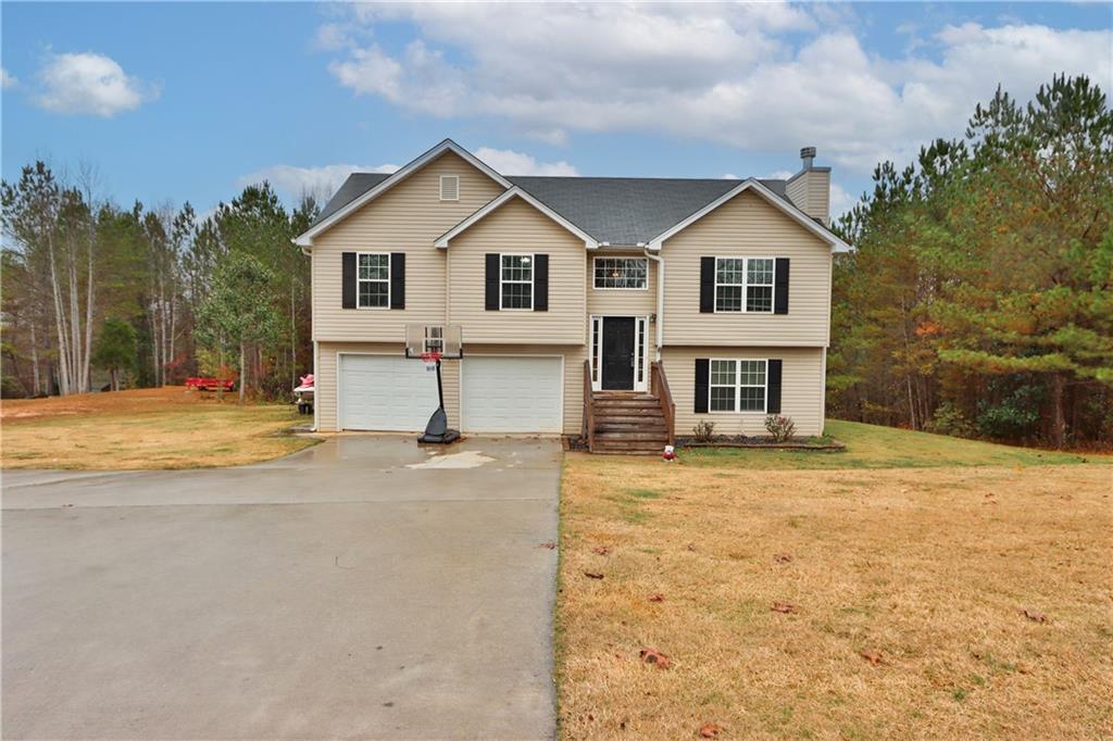 5464 Wg Robinson Road Gainesville, GA 30506 - Photo 1 of 1 a view of a white house with a yard
