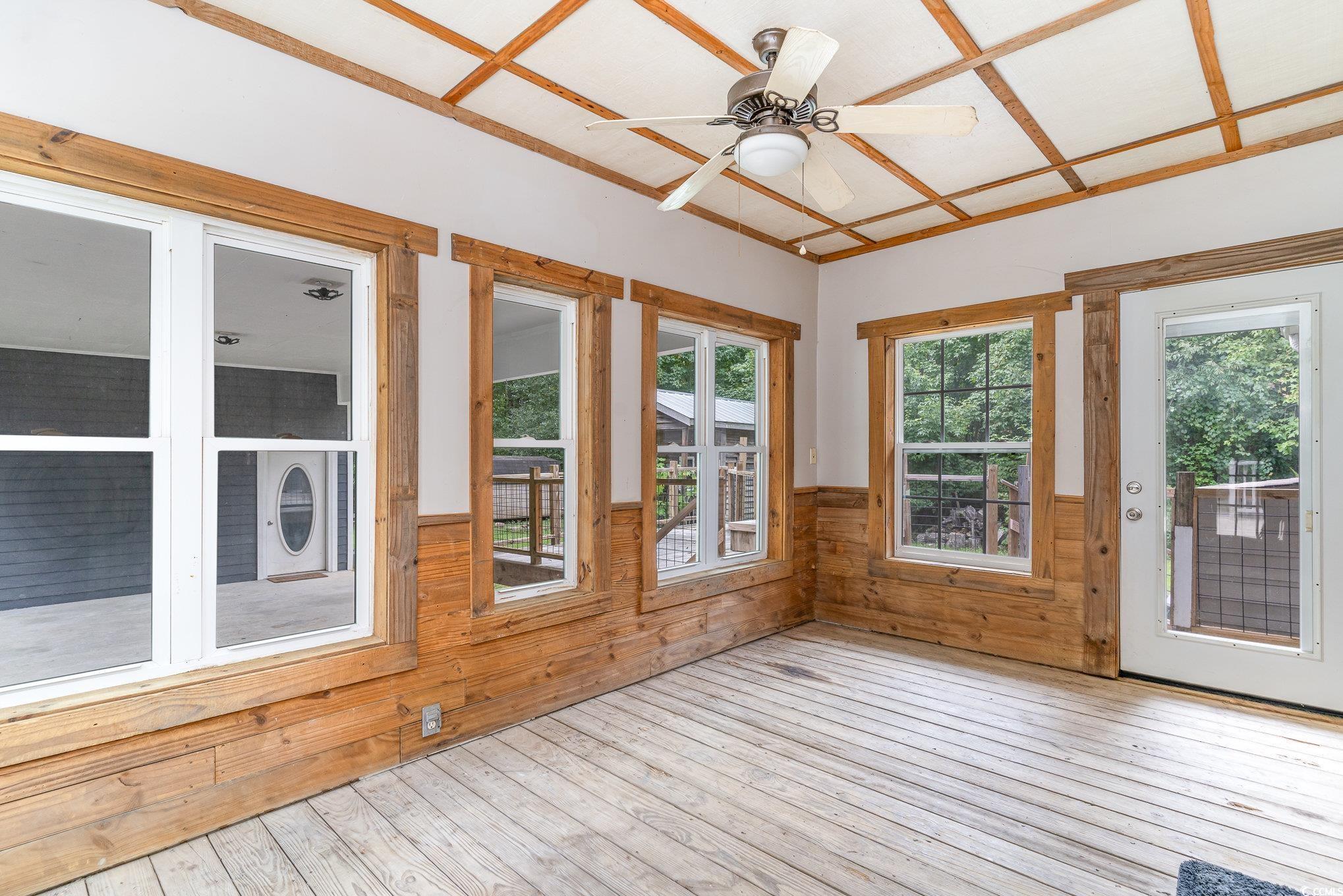 1359 Rodney Road Conway, SC 29526 - Photo 22 of 40 Unfurnished sunroom featuring ceiling fan